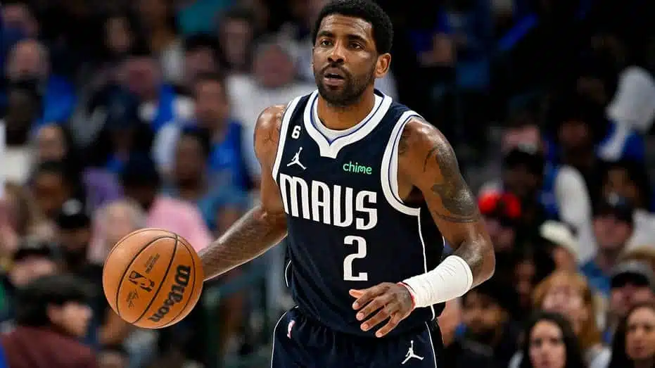 a photo of Kyrie Irving dribbling