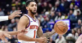 cameron-payne-dribbles-the-ball-during-a-knicks-game