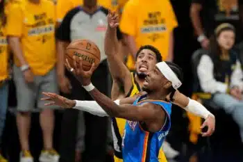 NBA Finals Shai drives on Hali