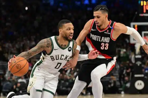Damian Lillard dribbles against Blazers