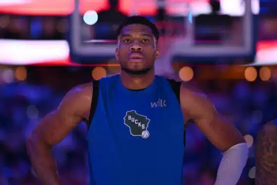 Giannis stands before a game